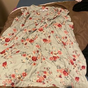 Blue floral sleeveless shirt